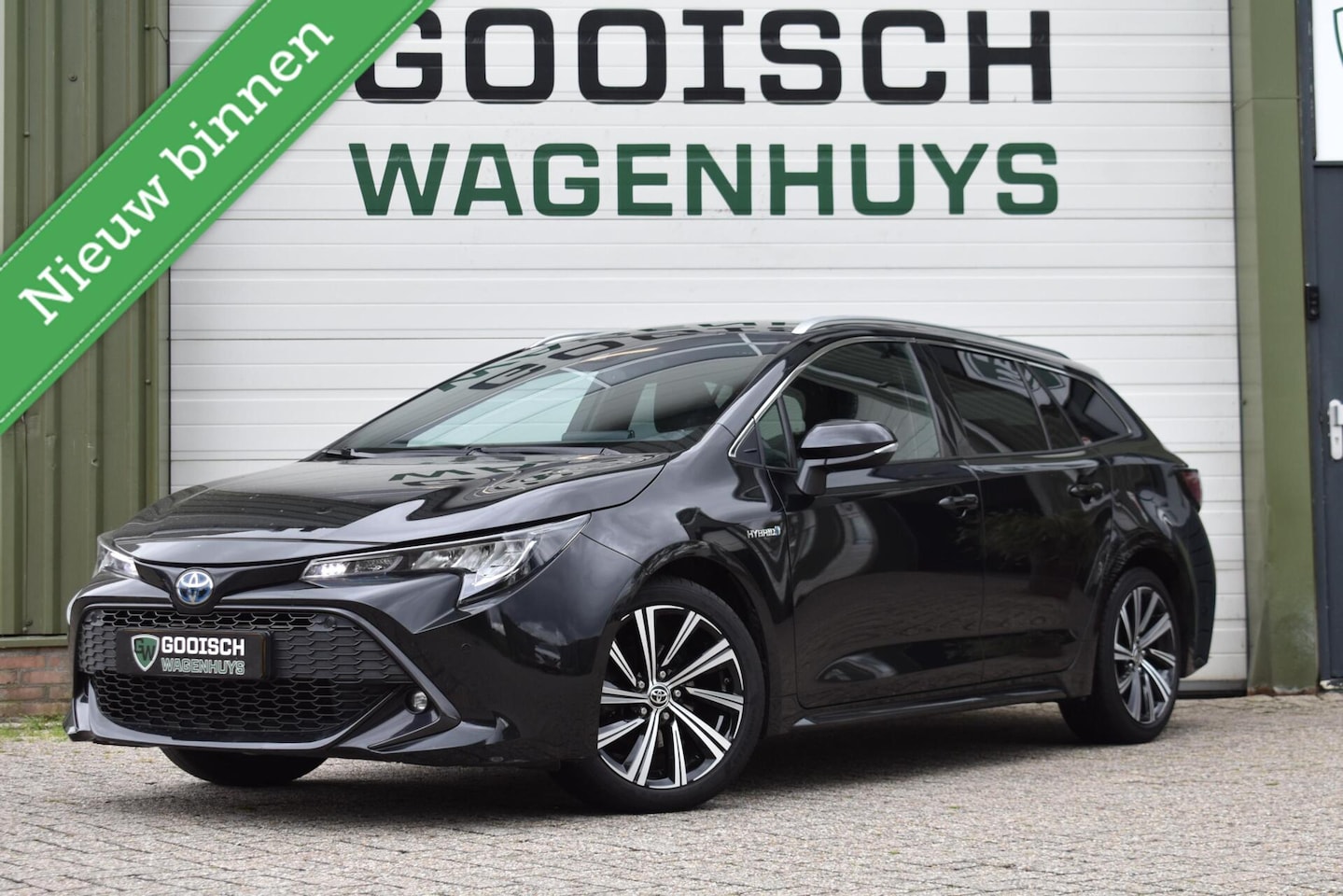 Toyota Corolla Touring Sports - 1.8 Hybrid Business Plus | Carplay | Stoelverwarming | Camera | - AutoWereld.nl