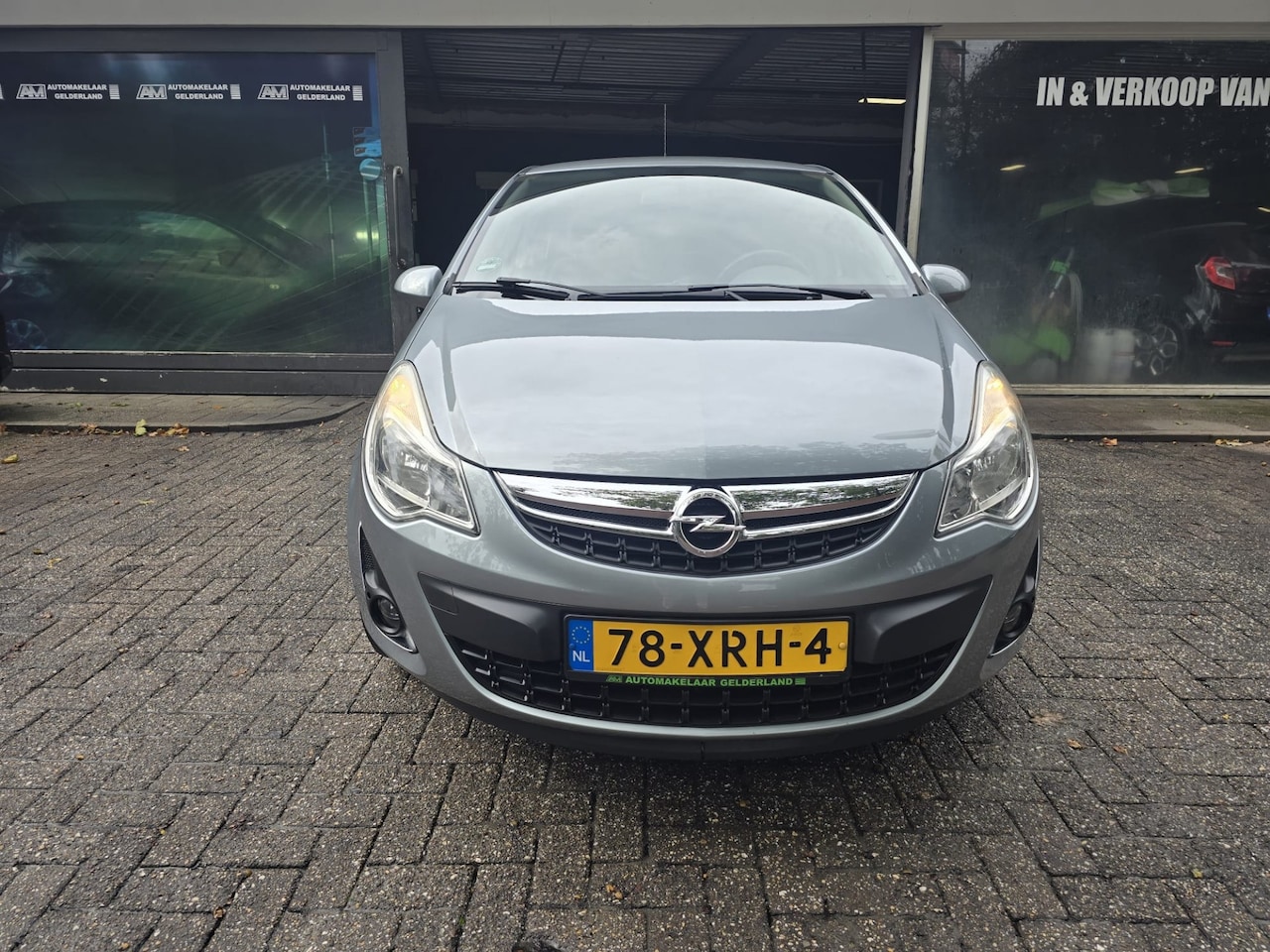 Opel Corsa - 1.4-16V Anniversary Edition | 1E EIGENAAR | 3/6 OF 12MND GARANTIE | AIRCO | NAVI | LMV | - AutoWereld.nl