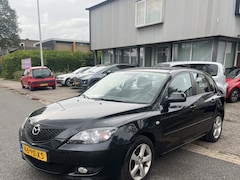 Mazda 3 Sport - 1.6 Touring 5 Deurs, Airco. Apk 10-02-2027 Goed rijdende (heeft wel hier en daar een plekj