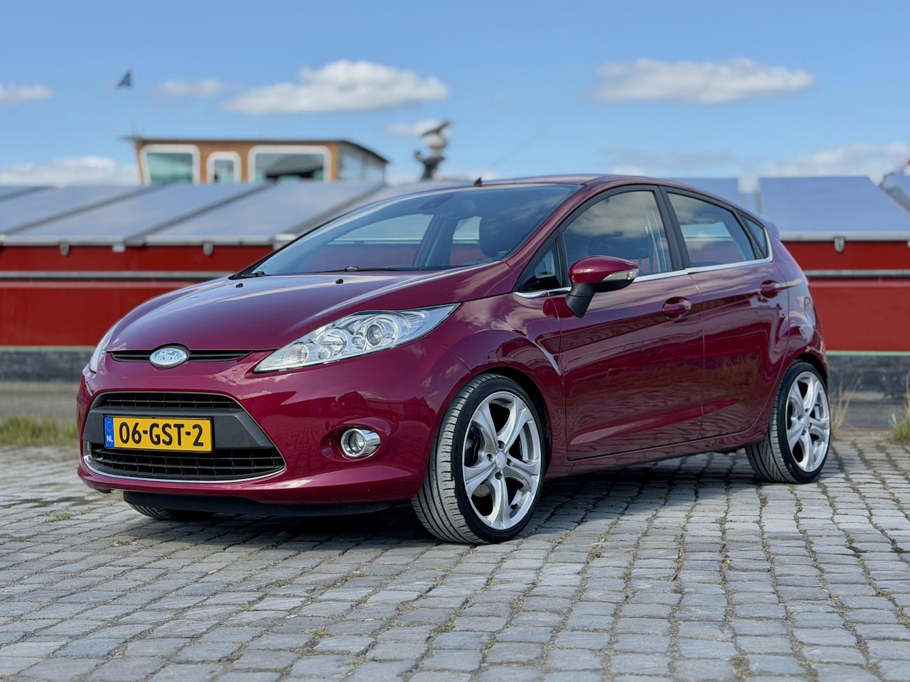 Ford Fiesta - 1.25 Titanium|Verwarmde voorruit|Cruise|Trekhaak - AutoWereld.nl