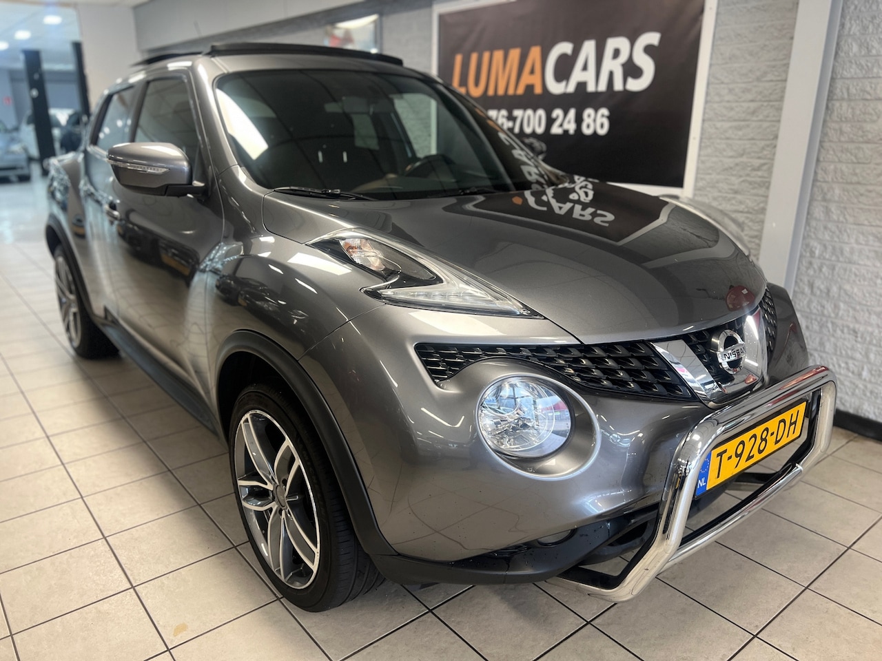 Nissan Juke - 1.2 DIG-T S/S Tekna | Pano | Camera | Distri. VV - AutoWereld.nl