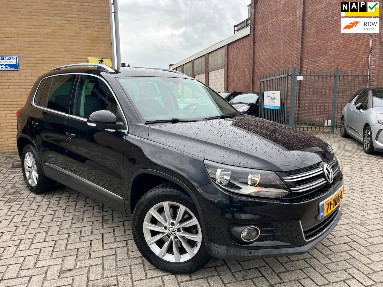 Volkswagen Tiguan - 1.4 TSI Sport&Style|Airco|Navi|PDC| - AutoWereld.nl