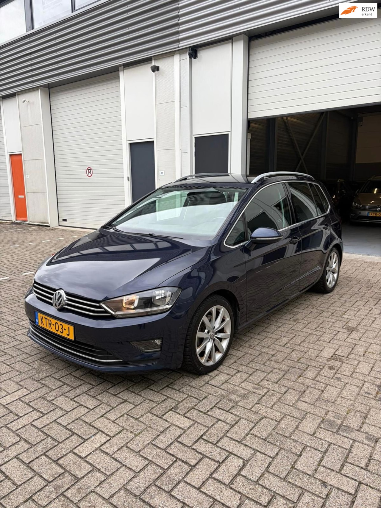 Volkswagen Golf Sportsvan - 2.0 TDI Highline DSG 2015 - AutoWereld.nl