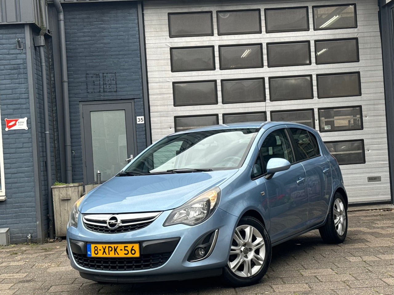 Opel Corsa - 1.4-16V BlitZ | Clima | Cruise | Navi | PDC | 5-DRS - AutoWereld.nl
