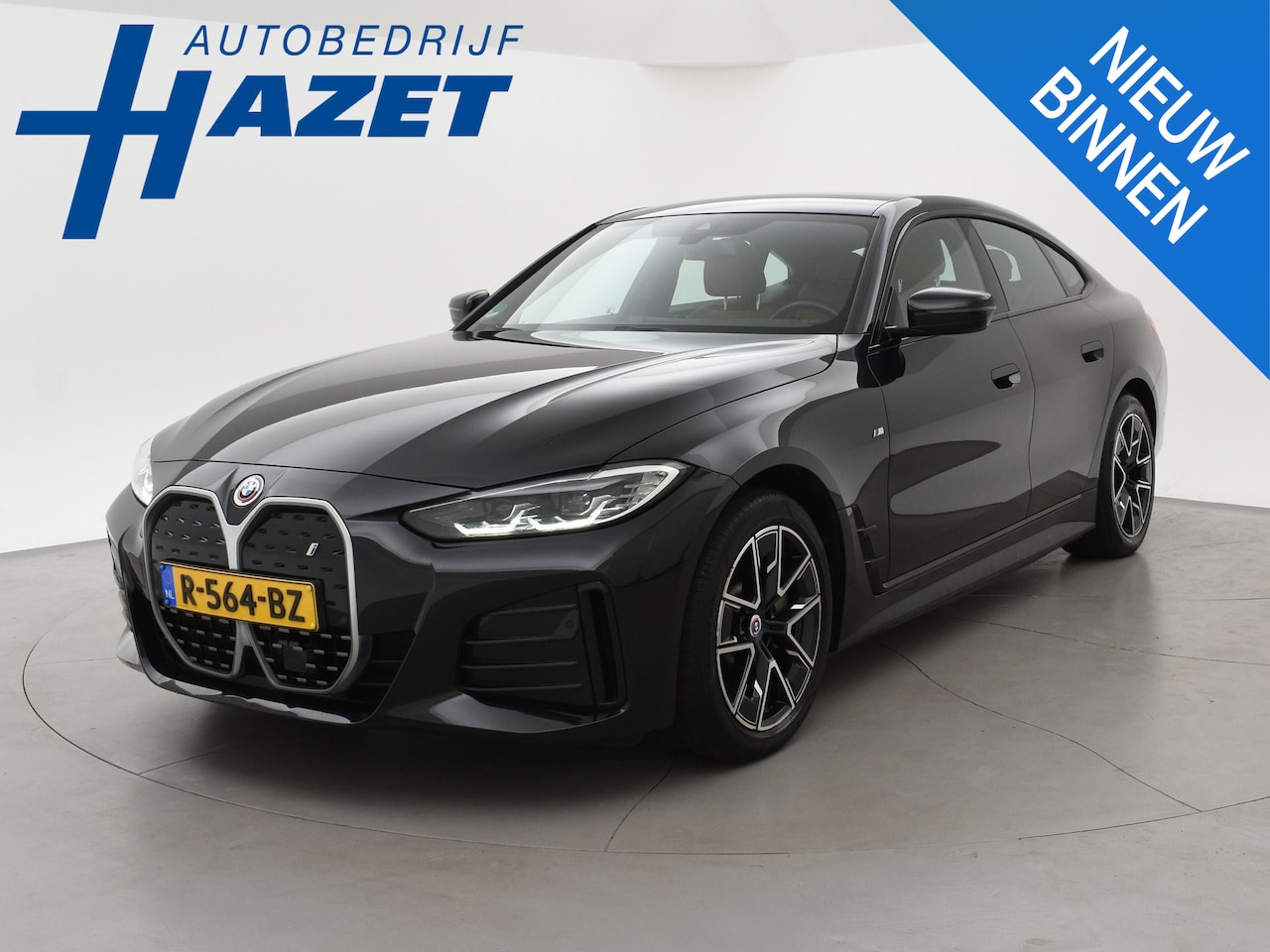 BMW i4 - eDrive40 84 kWh M-SPORT + ADAPTIVE CRUISE | SFEERVERLICHTING | LEDER SPORTINTERIEUR - AutoWereld.nl