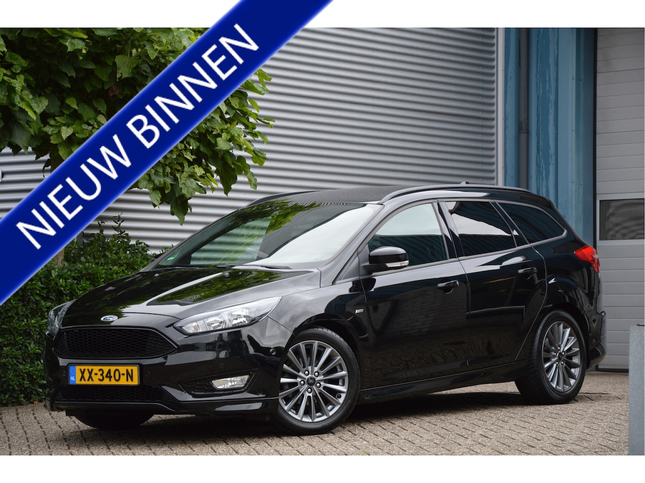 Ford Focus Wagon - 1.0 ST-LINE | NAVI | CRUISE | PDC | AIRCO | TREKHAAK | STOEL/STUURVERW | ENZ - AutoWereld.nl