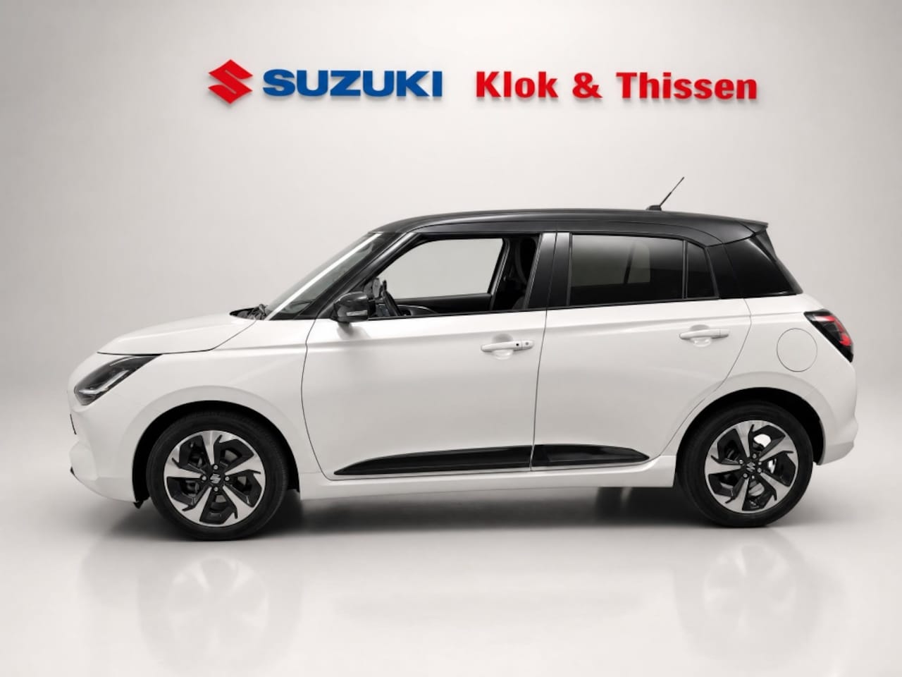 Suzuki Swift - fabrieksgar. t/m 14-05-2035 1.2 Style Smart Hybr Navi LMV CC Apple/Android Clima PDC - AutoWereld.nl