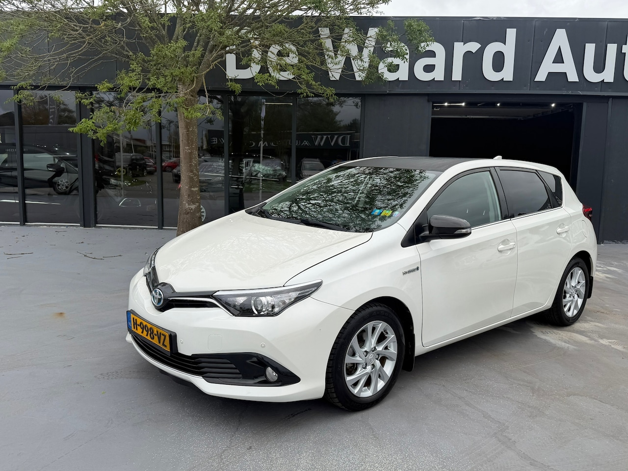 Toyota Auris - 1.8 Hybrid Business Pro/airco/cruise/navi/camera/PDC voor en achter/12 maanden garantie - AutoWereld.nl