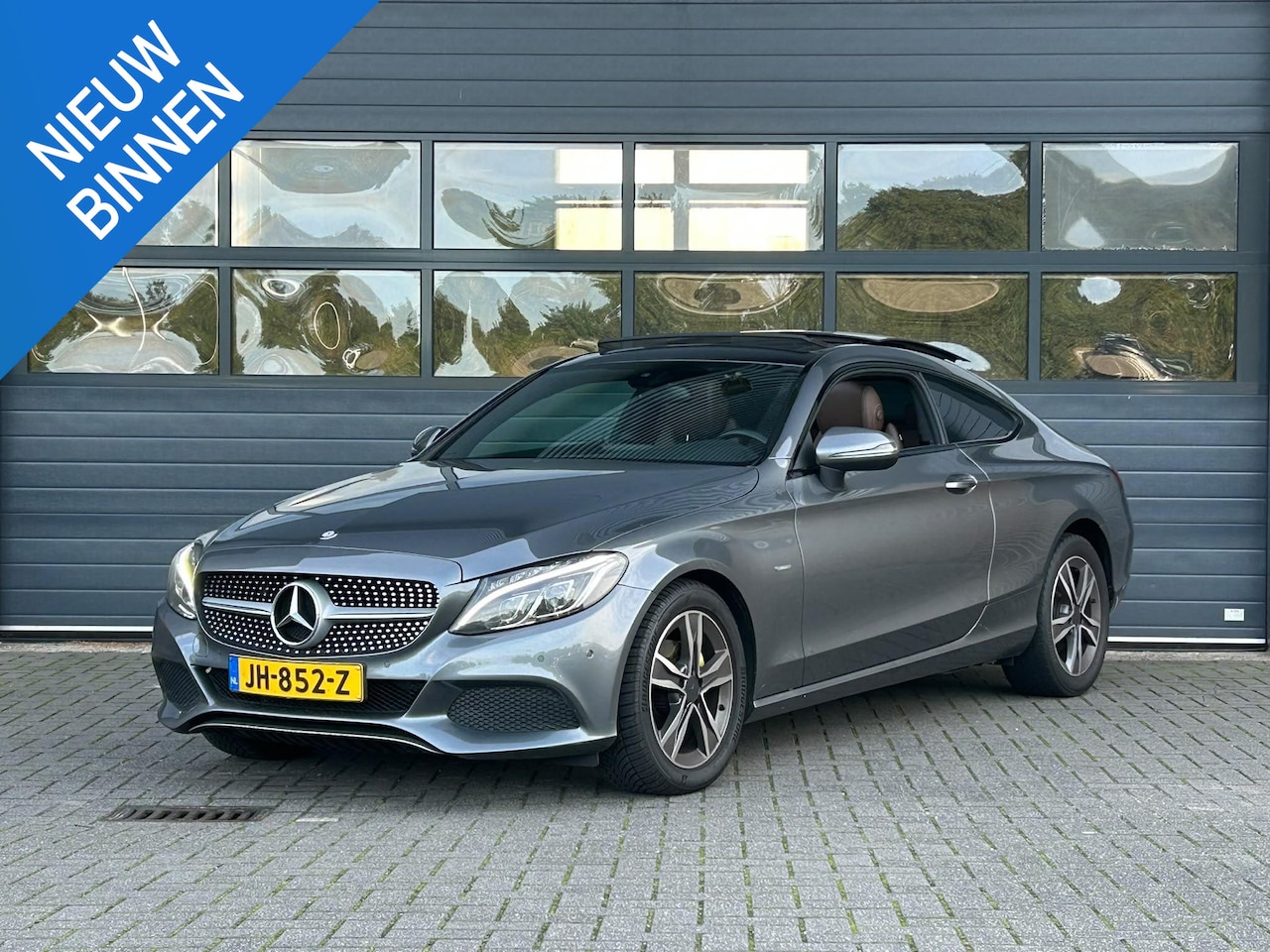 Mercedes-Benz C-klasse Coupé - 180 EDITION ONE I AUTOMAAT I SCHUIF/KANTELDAK I LEDEREN BEKLEDING I STOELVERWARMING - AutoWereld.nl