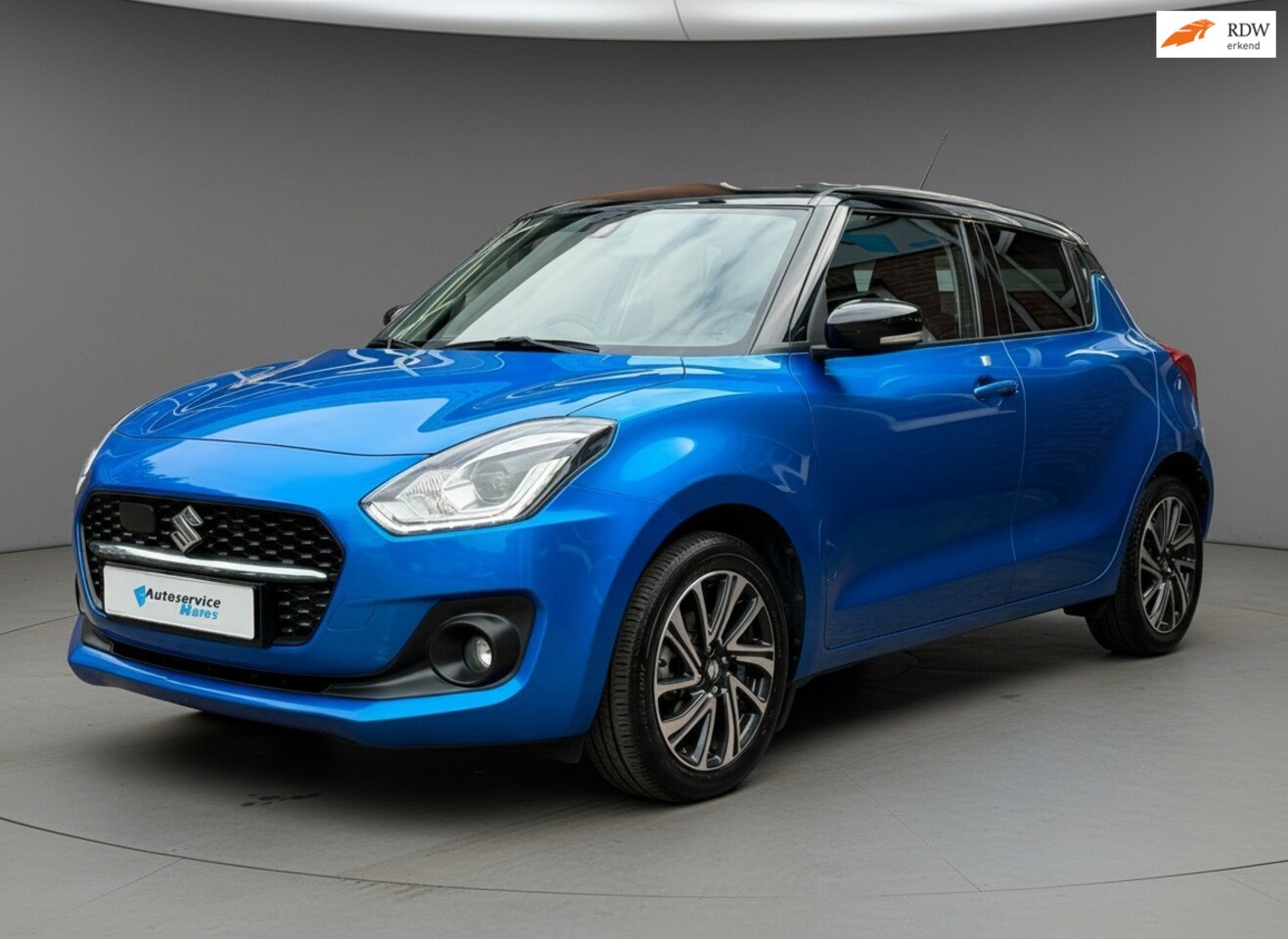 Suzuki Swift - 1.2 Style Smart Hybrid 1.2 Style Smart Hybrid, navi, camera, adapt cruise, stoelverw, clima - AutoWereld.nl