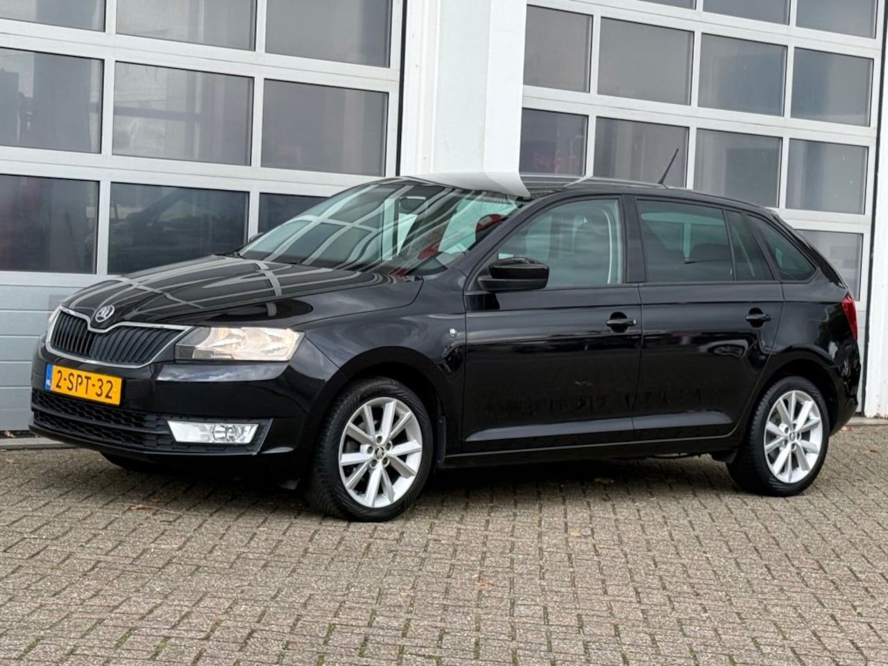 Skoda Rapid - 1.2 TSI 86PK Greentech Ambition Airco Navi Cruise Trekhaak - AutoWereld.nl