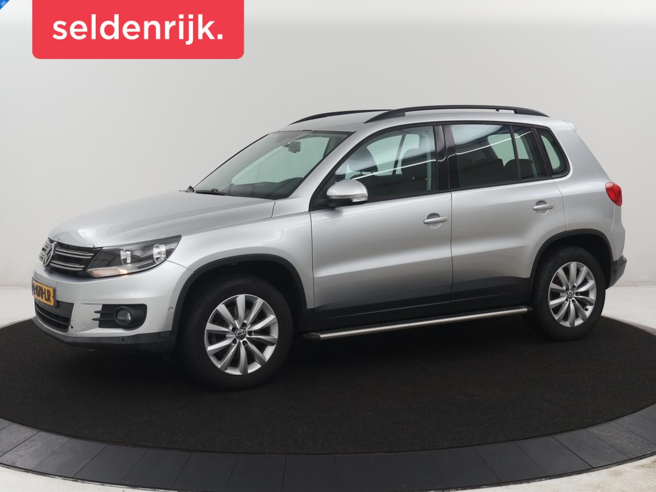 Volkswagen Tiguan - 1.4 TSI Sport&Style | Trekhaak | Cruise control | Stoelverwarming | Climate control | Blue - AutoWereld.nl