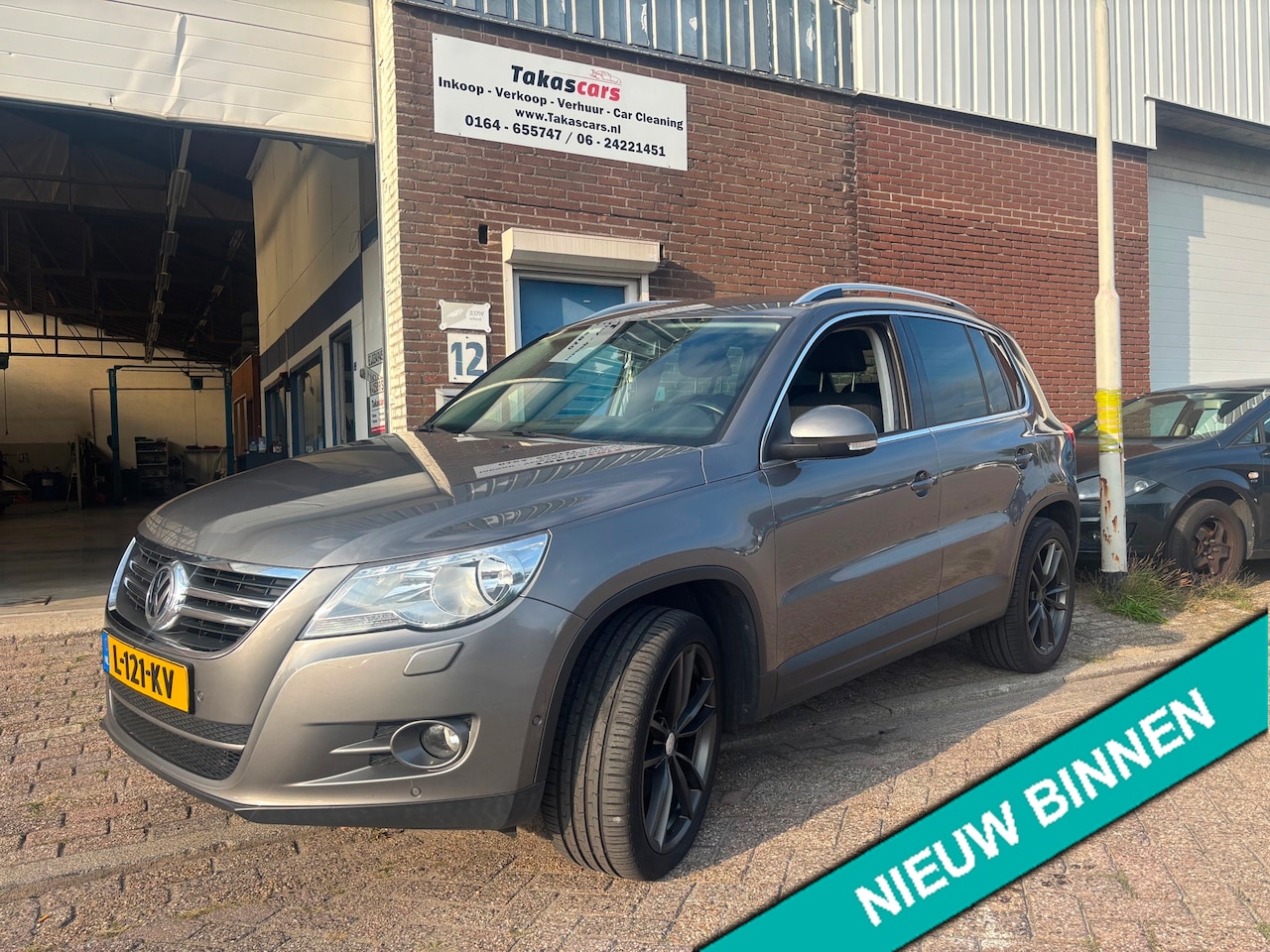 Volkswagen Tiguan - 2.0 TSI Comfort&Design 4Motion AUTOMAAT - AutoWereld.nl