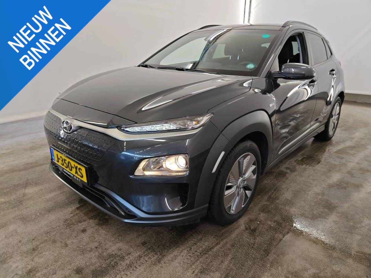 Hyundai Kona Electric - EV FASHION 64 kWh (100% SOH) I AUTOMAAT I TREKHAAK I P-CAMERA I APPLE CARPLAY - AutoWereld.nl