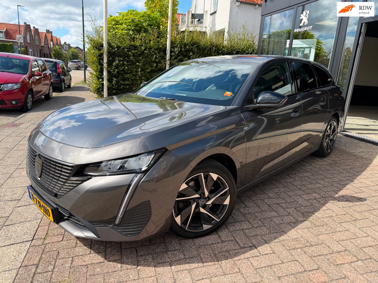 Peugeot 308 SW - 1.2 PureTech Allure Pack Business|Half Leder|Afn. Trekhaak|360 Camera - AutoWereld.nl