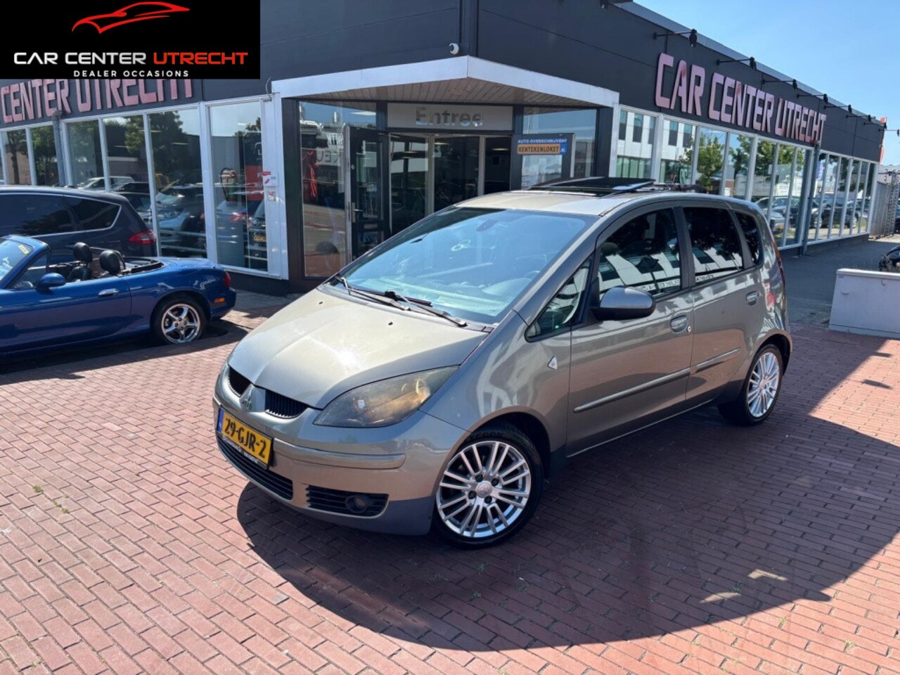 Mitsubishi Colt - 1.5 Sky 5drs airco dubb pano nette colt - AutoWereld.nl