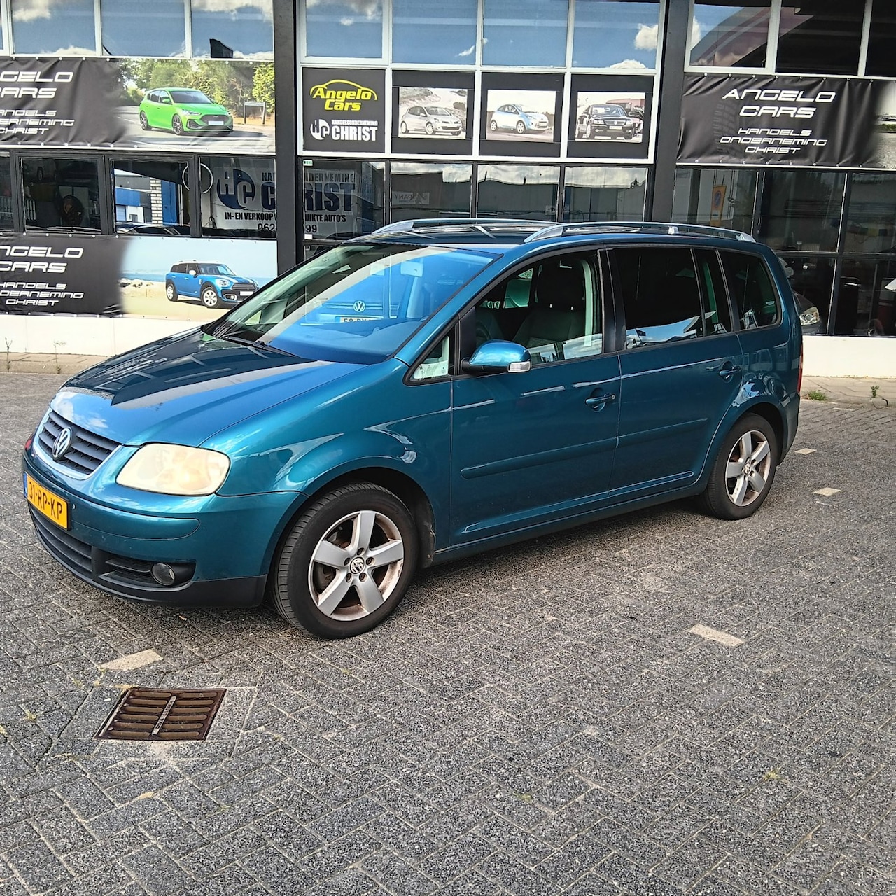 Volkswagen Touran - 2.0-16V FSI Highline 2.0-16V FSI Highline - AutoWereld.nl
