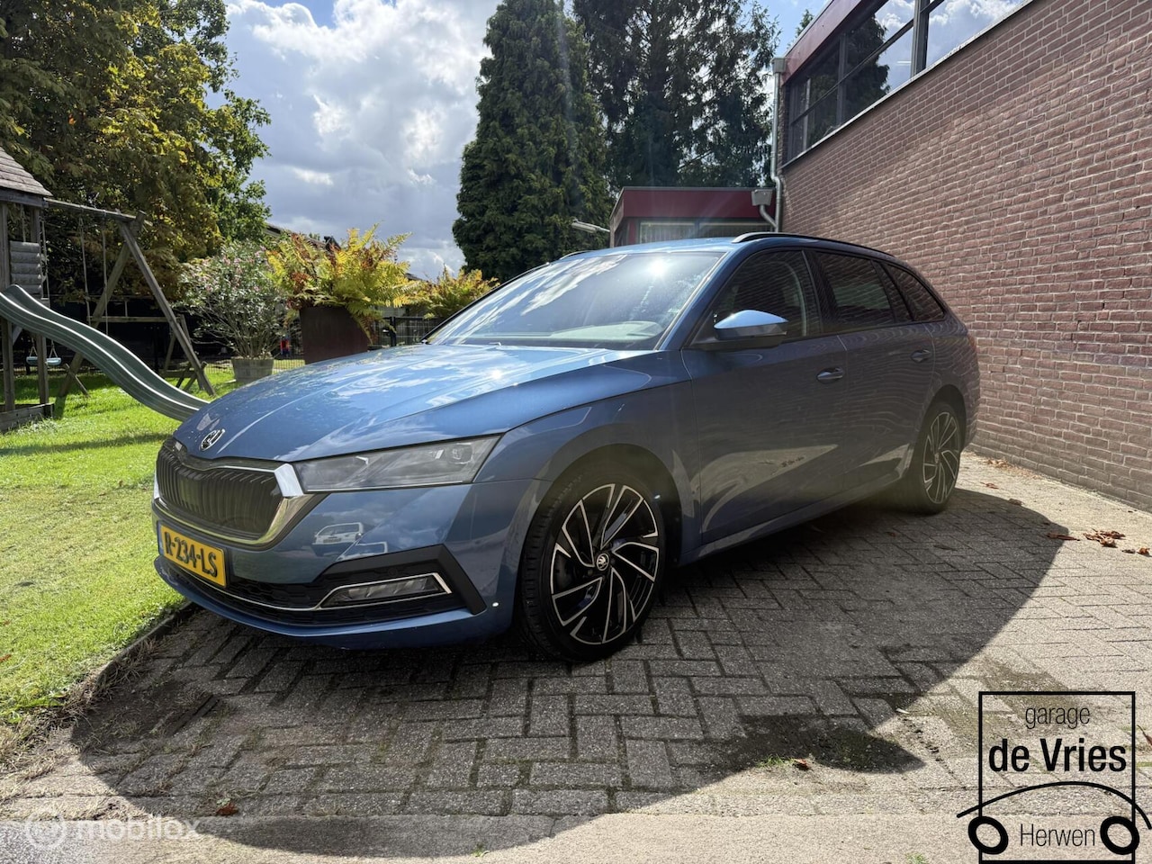 Skoda Octavia Combi - 1.5 e-TSI Business Edition aut - AutoWereld.nl