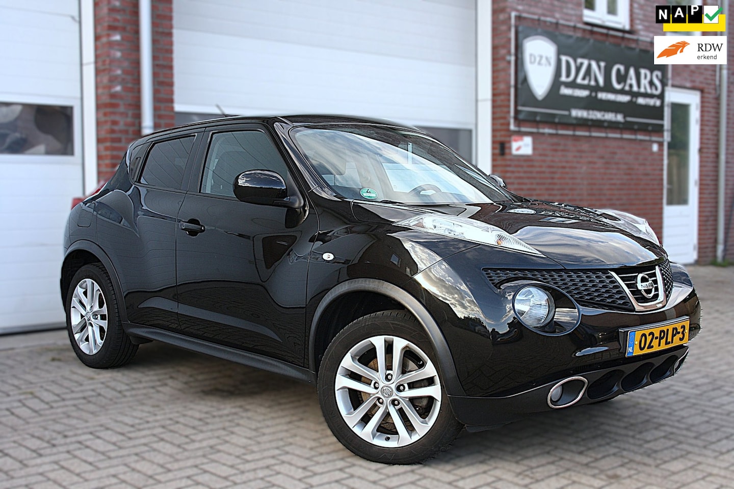 Nissan Juke - 1.6 DIG-T Tekna Camera|Trekhaak|Leer|190pk|Nap|Cruise control| - AutoWereld.nl