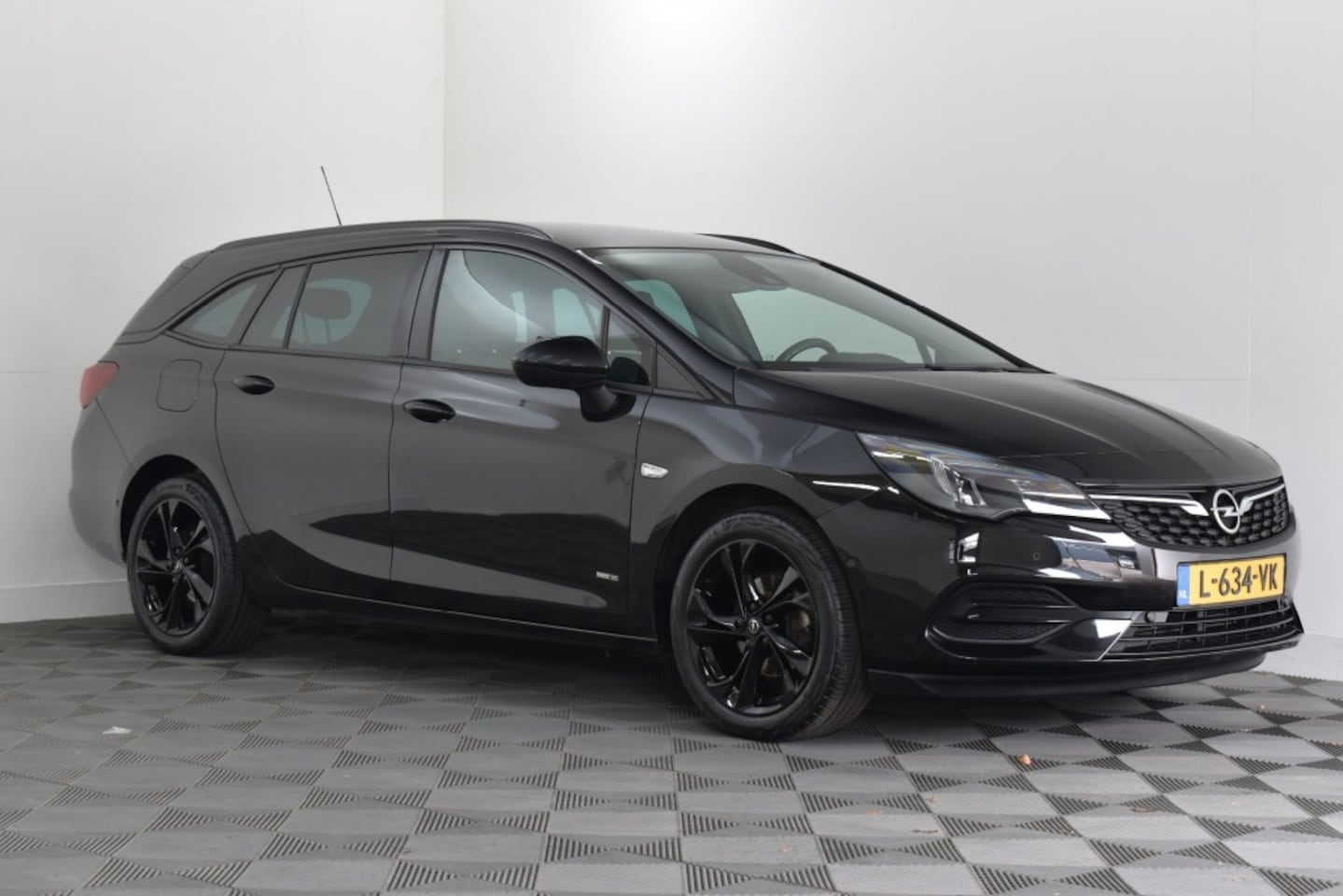 Opel Astra Sports Tourer - Sports Tourer 1.2 Turbo 110PK DESIGN en TECH - AutoWereld.nl
