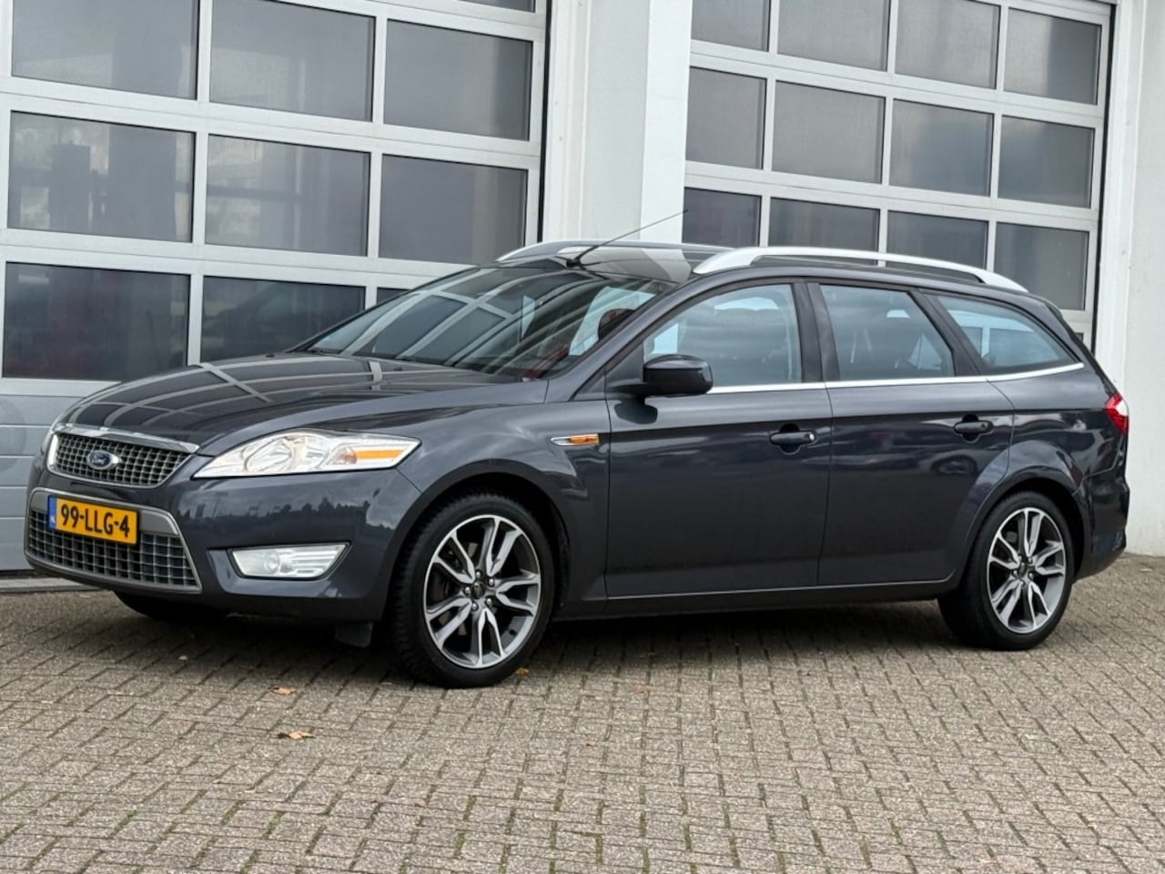 Ford Mondeo - 2.0-16V Limited 146Pk Navi Clima Cruise Pdc Trekhaak - AutoWereld.nl
