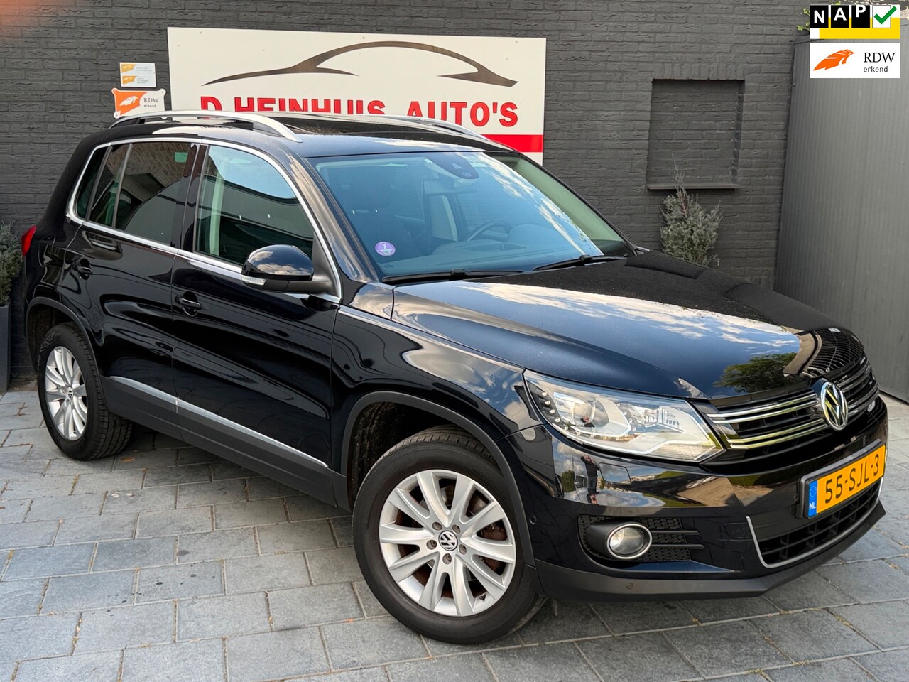 Volkswagen Tiguan - 1.4 TSI Sport&Style PANODAK - AutoWereld.nl