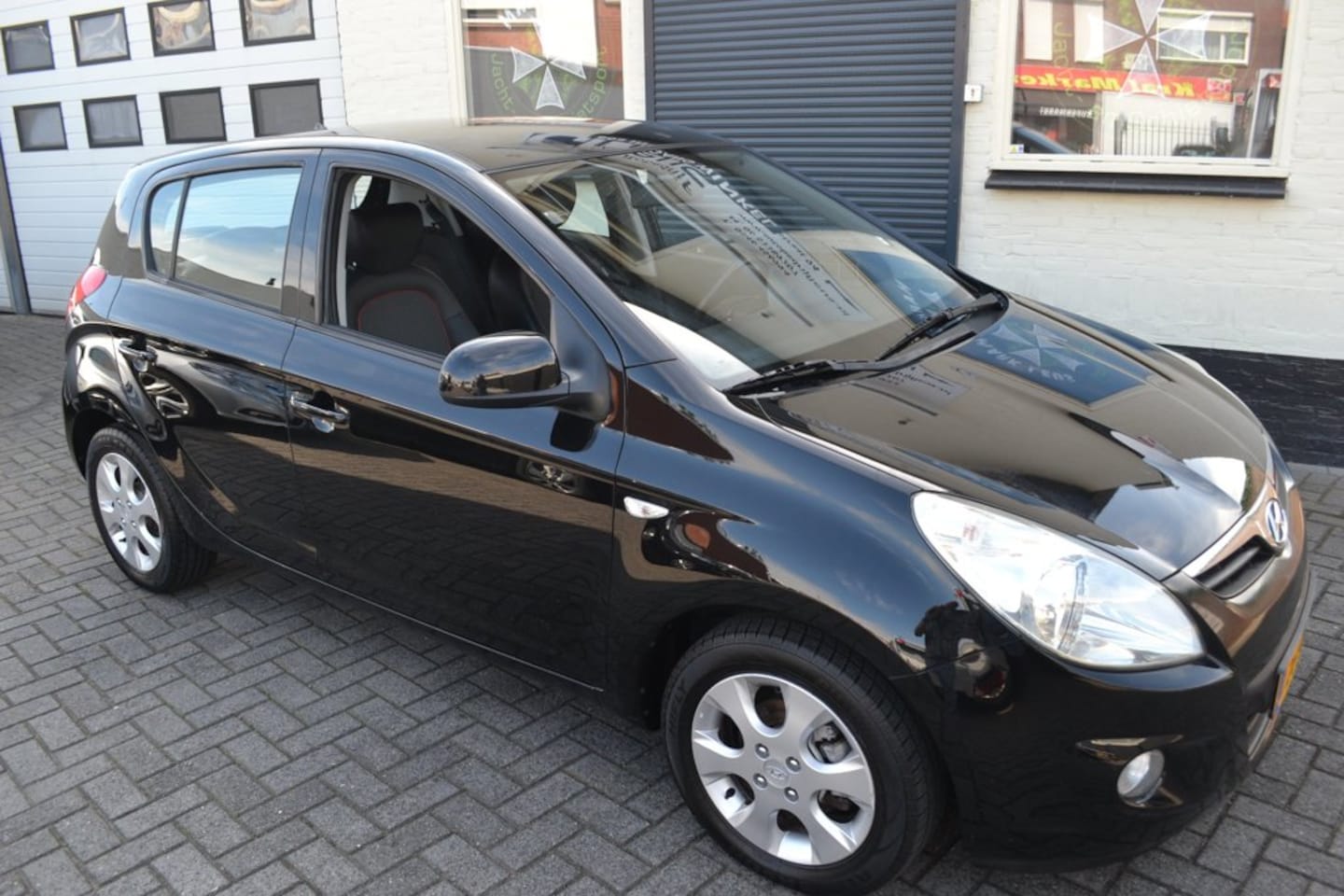 Hyundai i20 - 1.4i i-Catcher Sport uitvoering - AutoWereld.nl