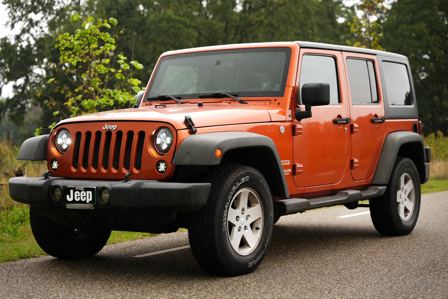 Jeep Wrangler Unlimited - 3.8 4x4 JKU Facelift interieur 2011 - AutoWereld.nl