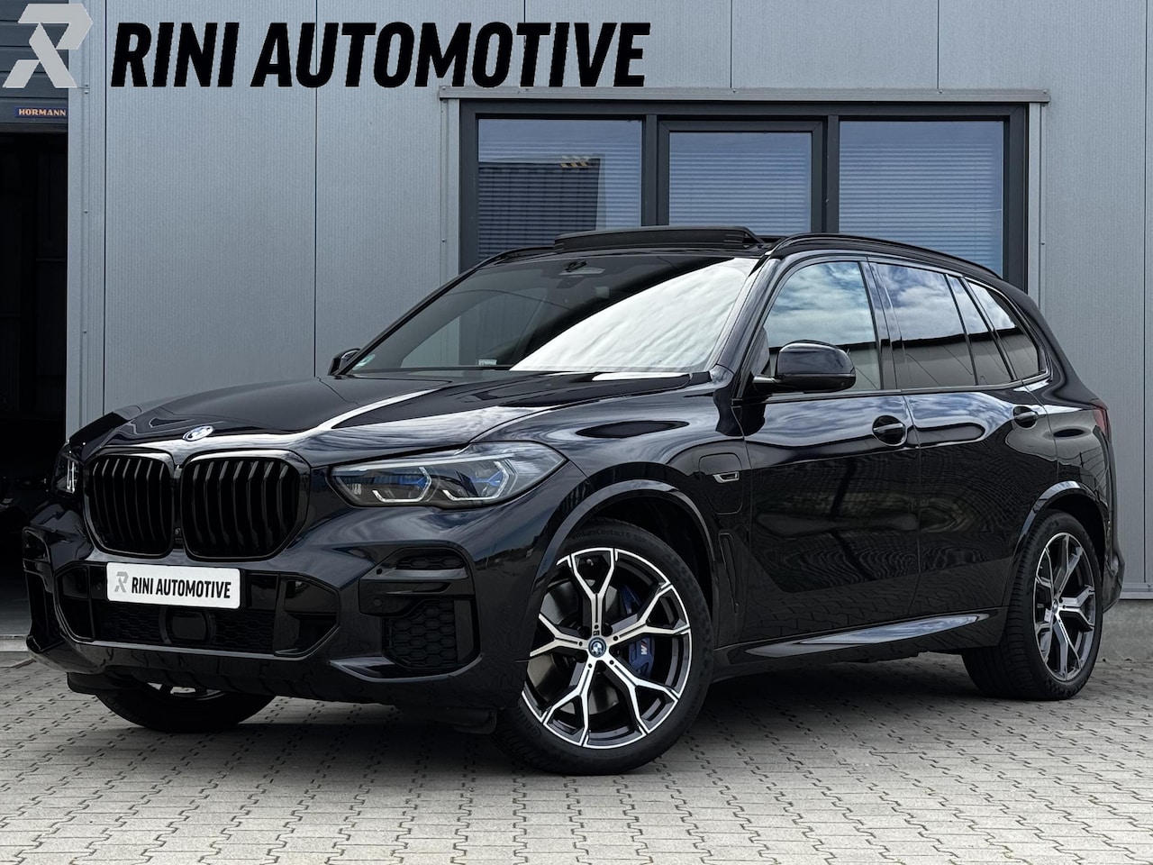 BMW X5 - xDrive45e High Executive 398 PK | Carbon | Sky lounge | 4 wiel sturing | Trekhaak - AutoWereld.nl