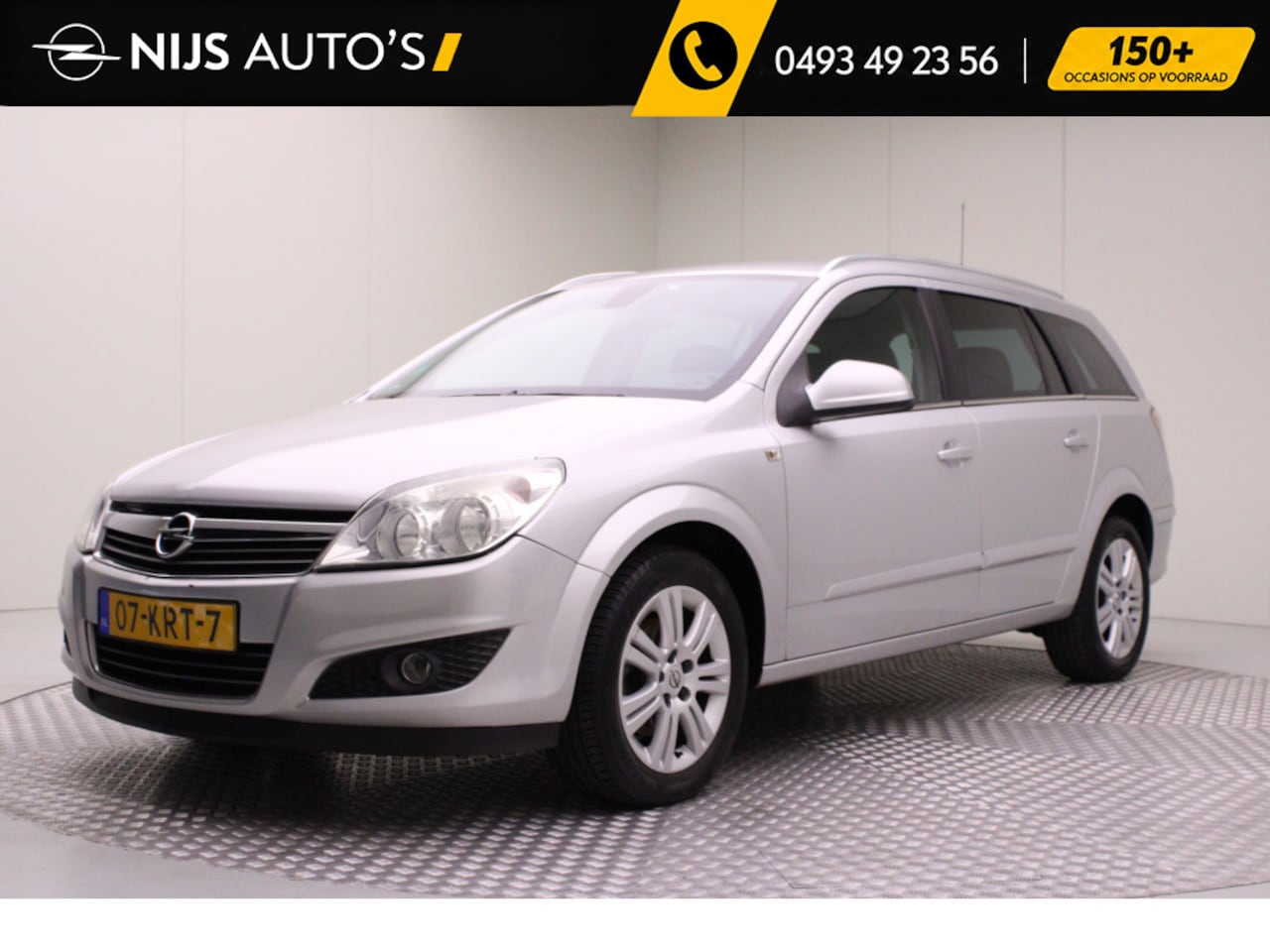 Opel Astra Wagon - 1.6 Cosmo | lederen bekleding | bluetooth | climate control | navigatie | stoel verwarming - AutoWereld.nl