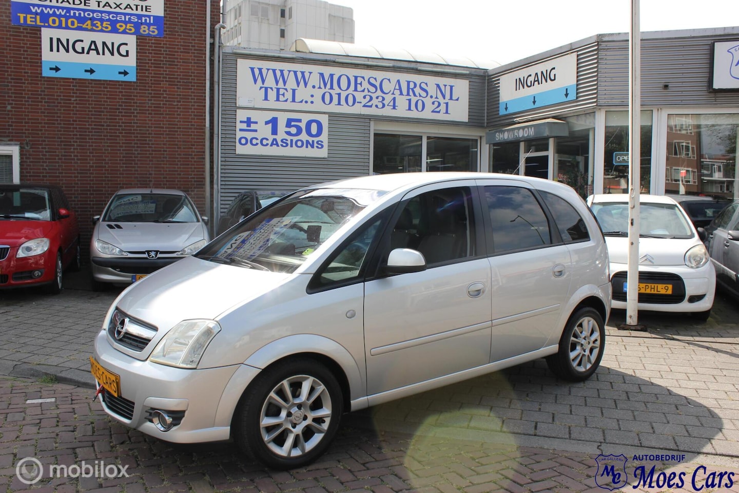 Opel Meriva - 1.6-16V Cosmo AIRCO / PARKKERCAMERA - AutoWereld.nl