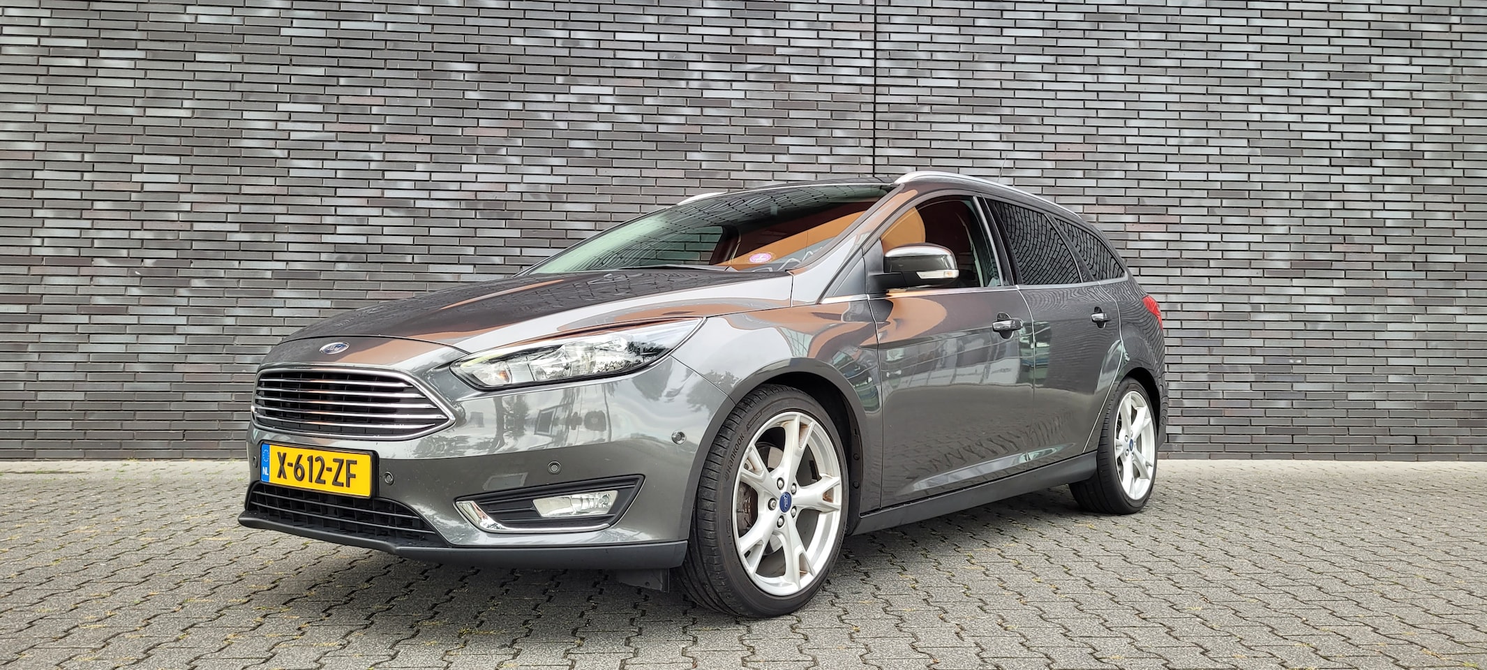 Ford Focus Wagon - 1.5 Titanium | trekhaak | nwe distr.riem | stlverw - AutoWereld.nl