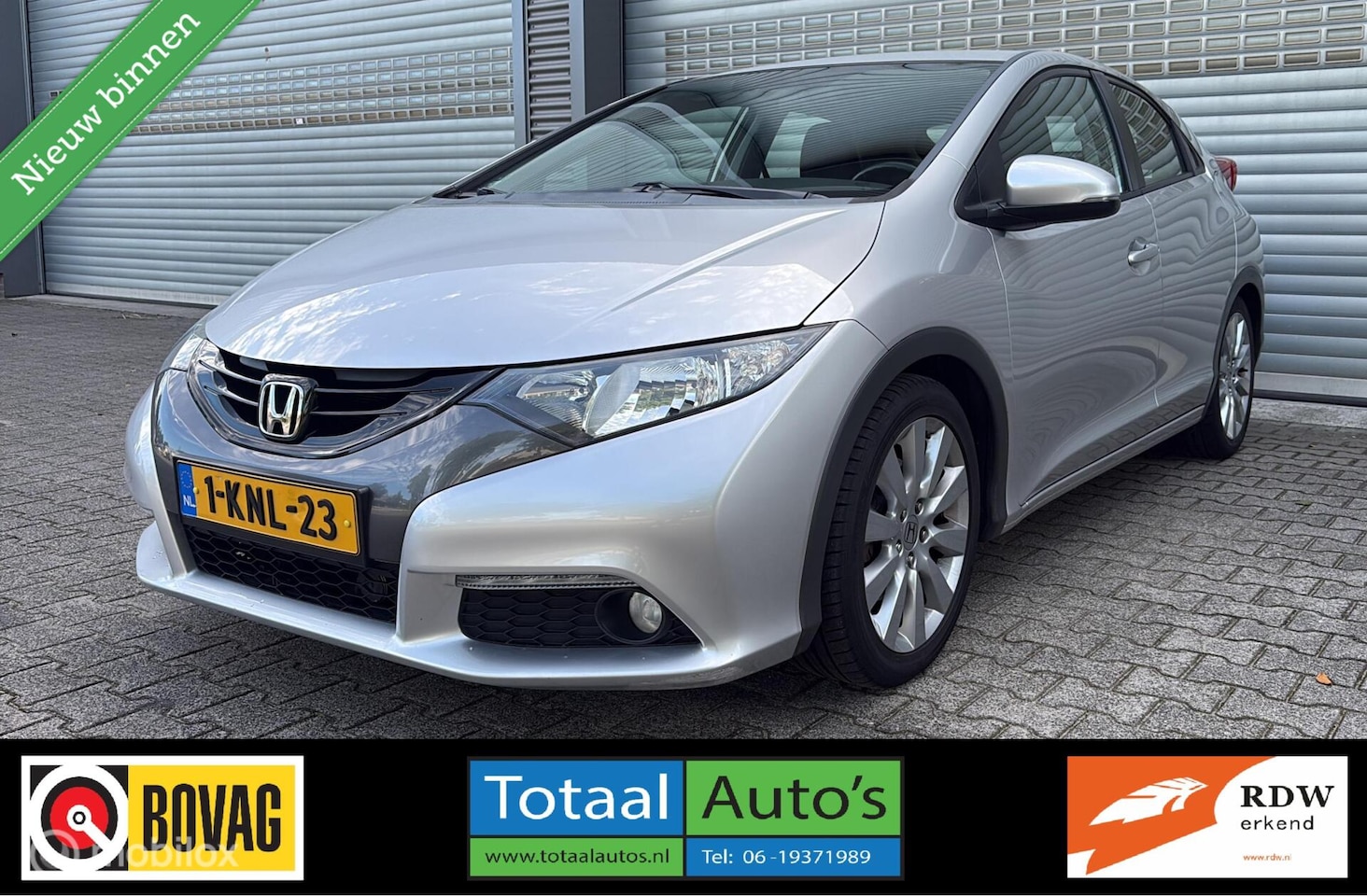 Honda Civic - 1.4 Sport*CRUISE*NAVI*CAMERA*TREKH*NEDERLANDS - AutoWereld.nl