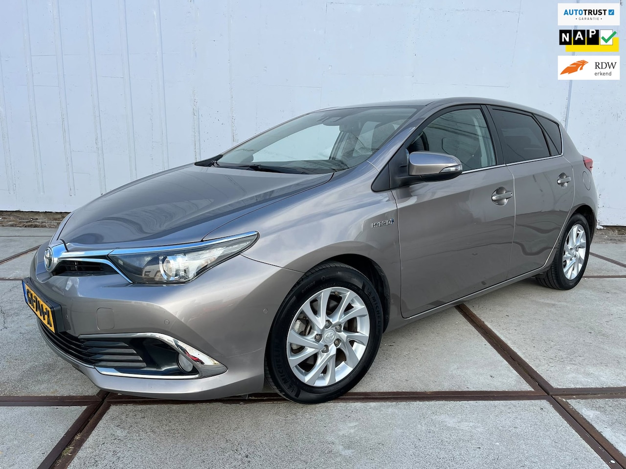 Toyota Auris - 1.8 Hybrid Executive Clima | bluetooth | stoelverwarming | navi | isofix | Lm velgen | pri - AutoWereld.nl