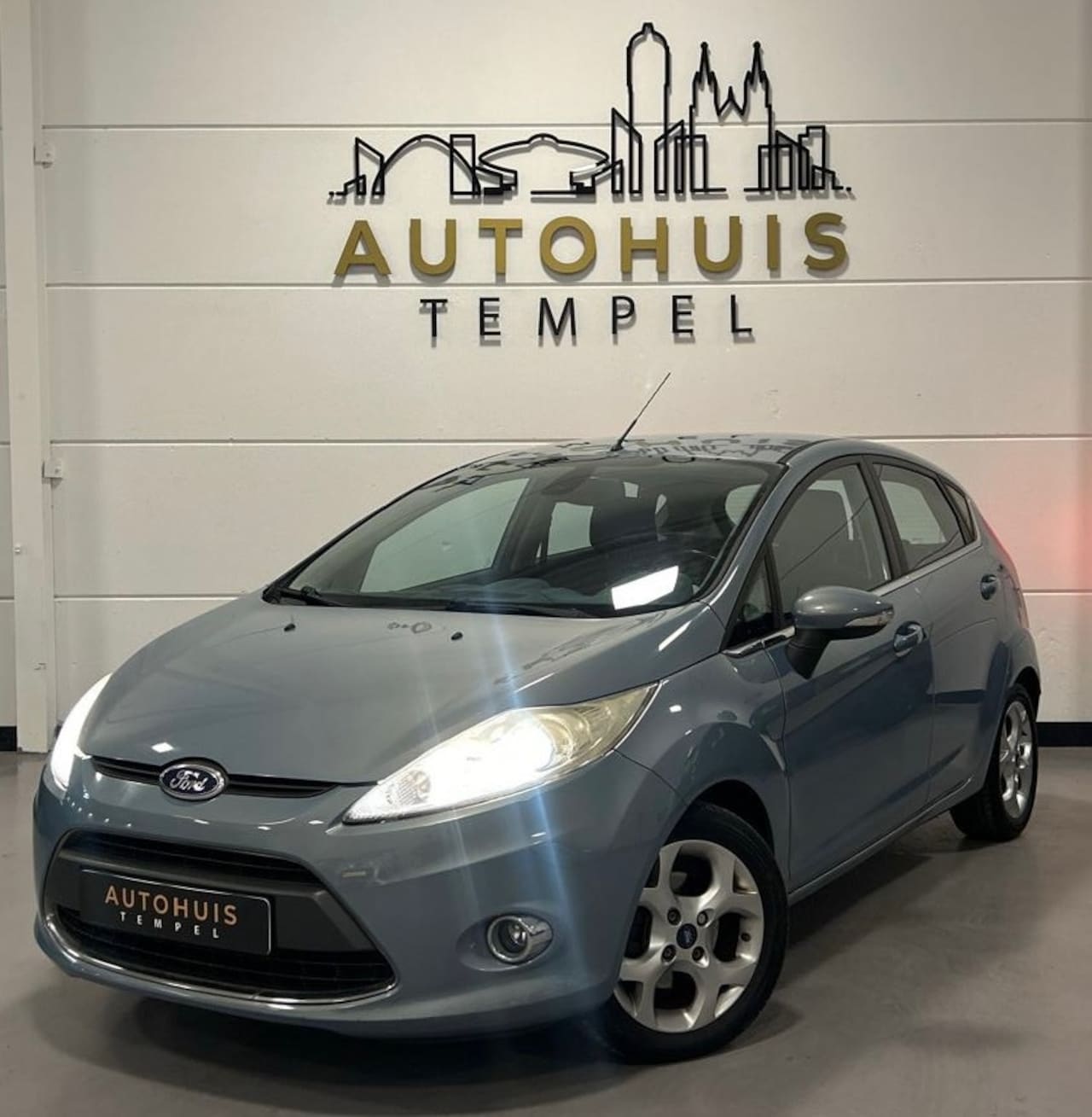 Ford Fiesta - 1.25 Titanium Nap Airco Cruise Climate 5Deurs Trekhaak - AutoWereld.nl