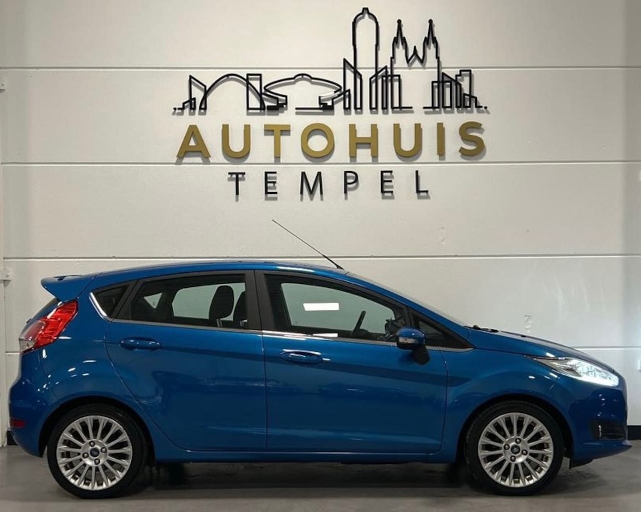 Ford Fiesta - 1.0 EcoBoost Titanium Nap Airco Cruise Climate Start/Stop Parkeersensoren Trekhaak - AutoWereld.nl