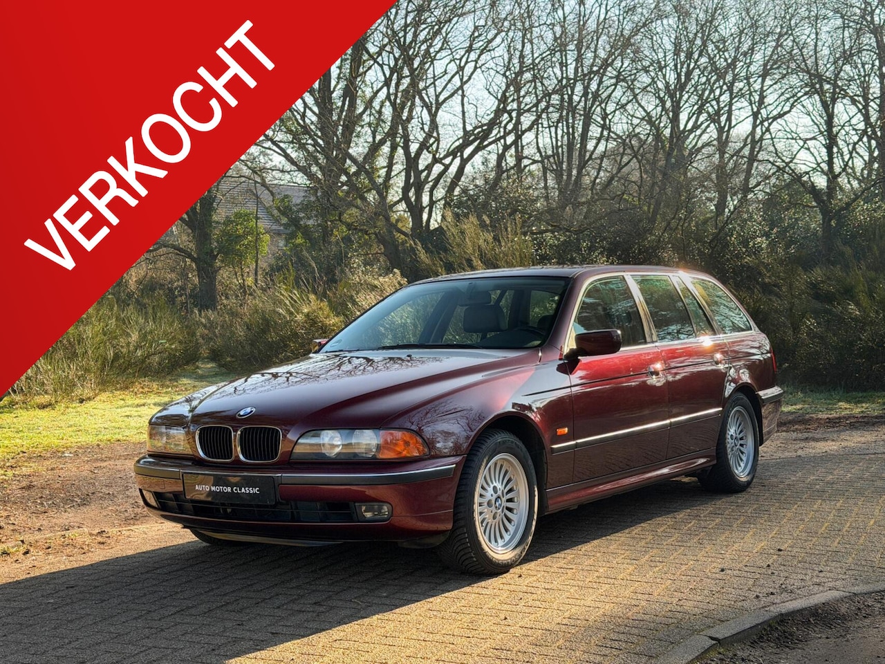 BMW 5-serie Touring - E39 | Royal Red | Blijvend youngtimer - AutoWereld.nl