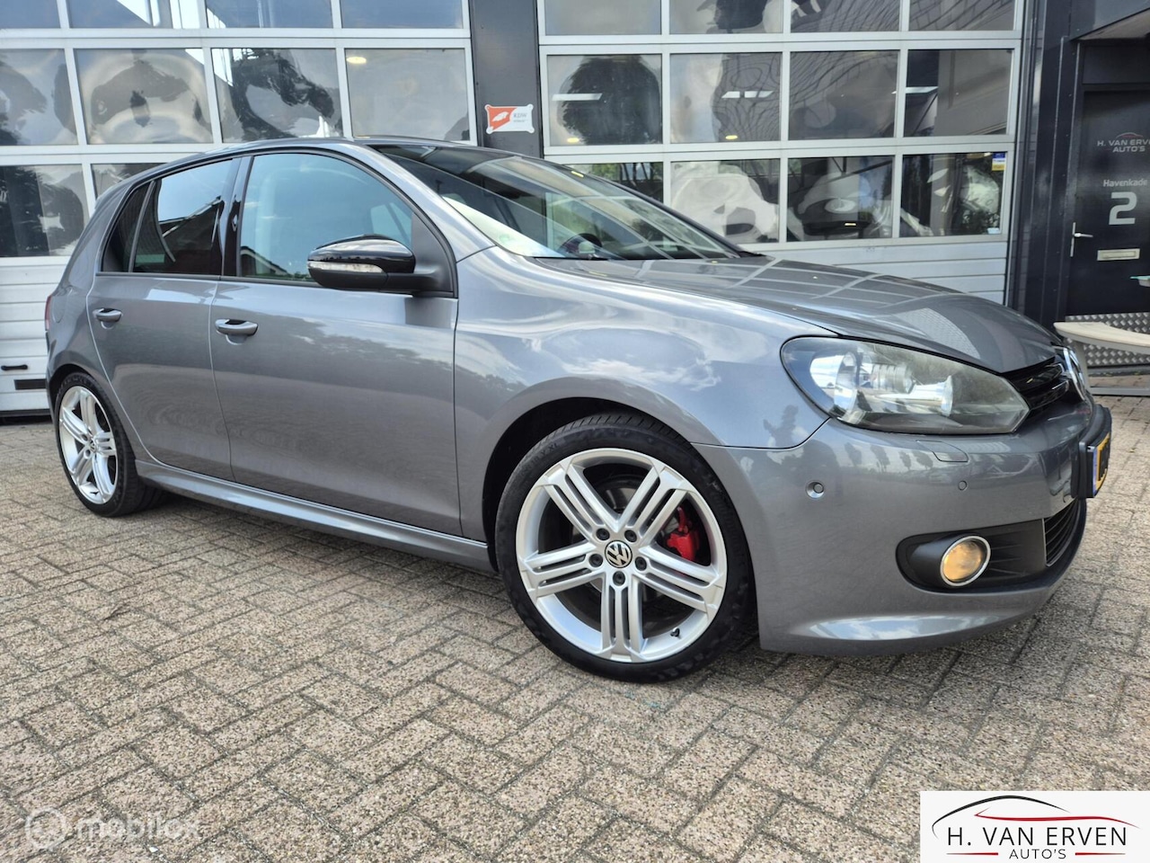 Volkswagen Golf - 1.2 Highline SCHUIFKANTELDAK XENON PDC 18" - AutoWereld.nl
