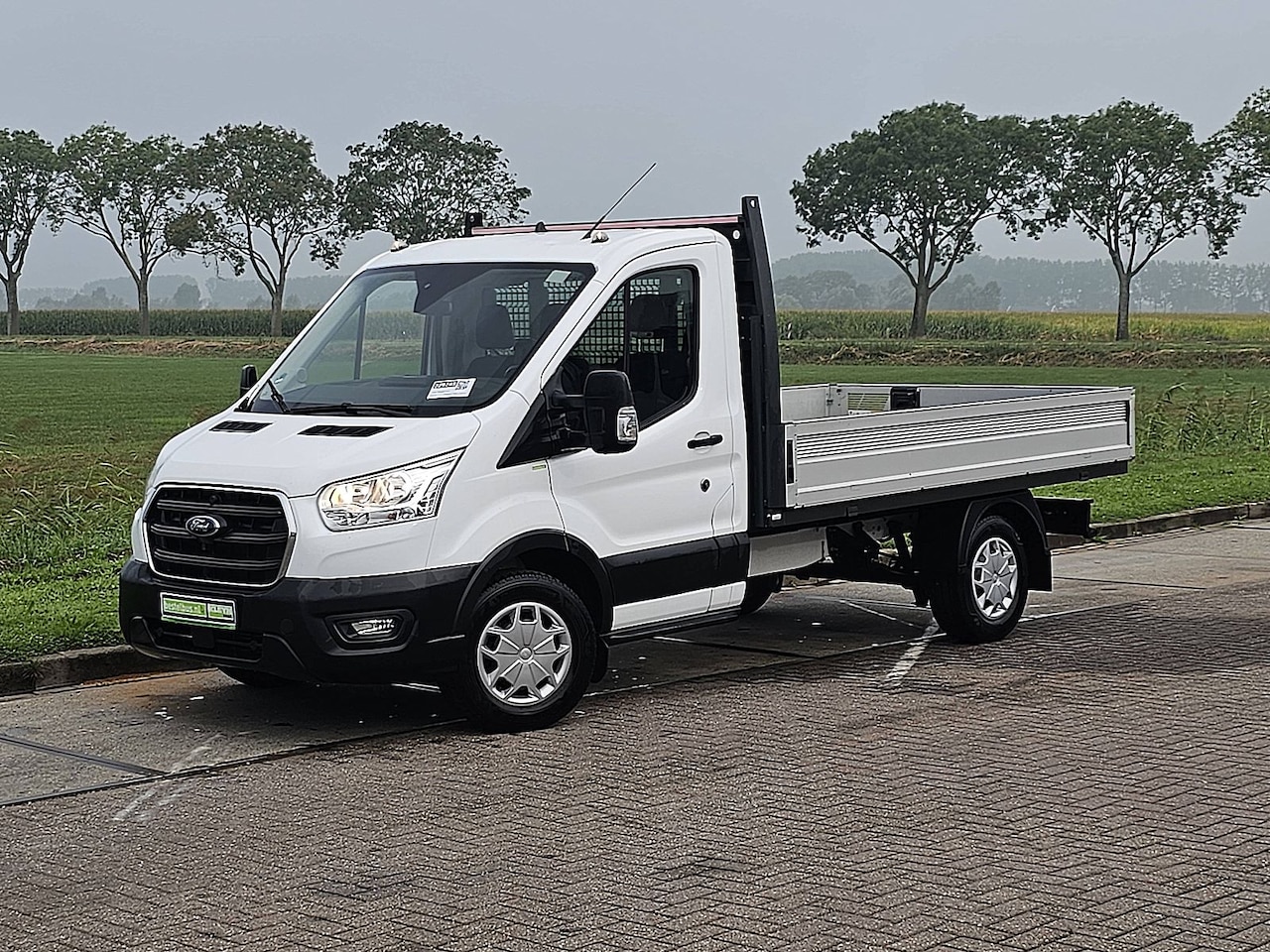 Ford Transit - 330 2.0 L2H1 Open Laadbak Cruise control, Airco, Enkele cabine, 130Pk, 1e Eigenaar, Onderh - AutoWereld.nl