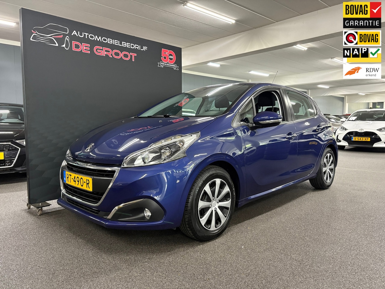 Peugeot 208 - 1.2 PureTech Blue Lion/ NL auto/ Trekhaak/ Navi/ Apple carplay - AutoWereld.nl