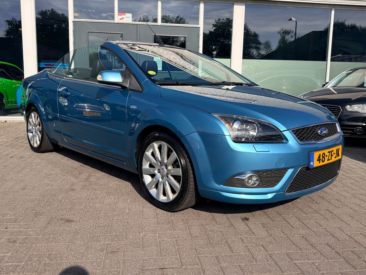 Ford Focus Coupé-Cabriolet - 2.0-16V Titanium/Eerste Eigenaar/Keyles/Automaat/Leer/Dealer Onderhouden. - AutoWereld.nl