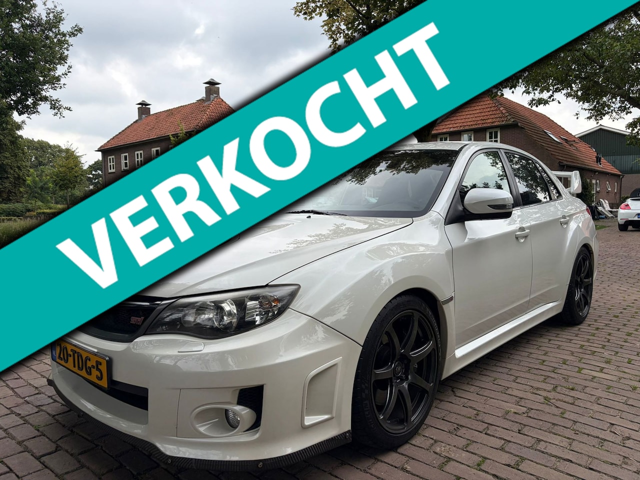 Subaru WRX STI - 2.5 T Sport | Xenon | Parelmoer | Uniek | Sportstoelen | Navigatie | Cruise Control | Nede - AutoWereld.nl