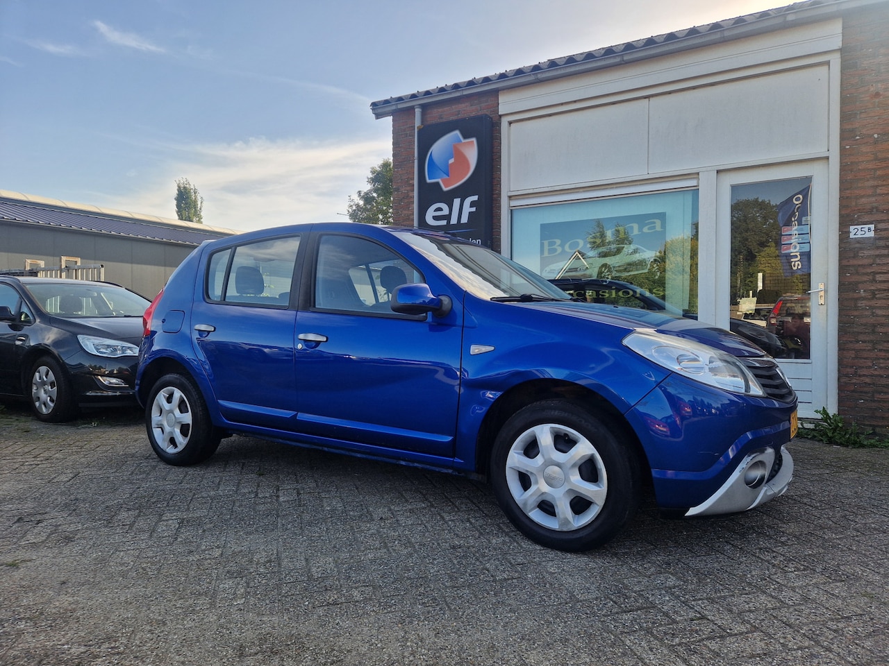 Dacia Sandero - 1.2i ''Lauréate'' Airco - Cruise - Apk 22-02-2027 !! - AutoWereld.nl