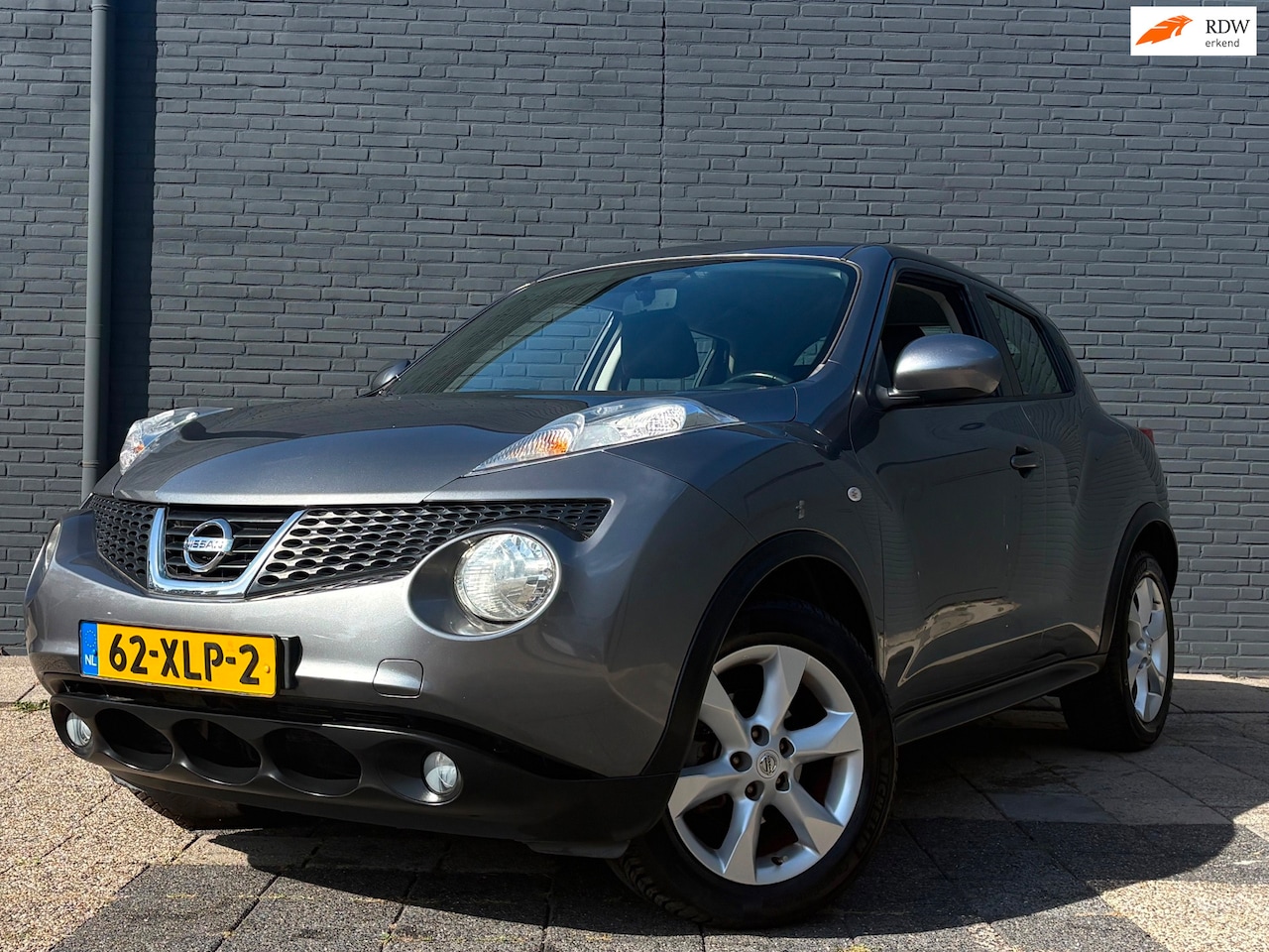 Nissan Juke - 1.6 Acenta | Navi | Airco - AutoWereld.nl