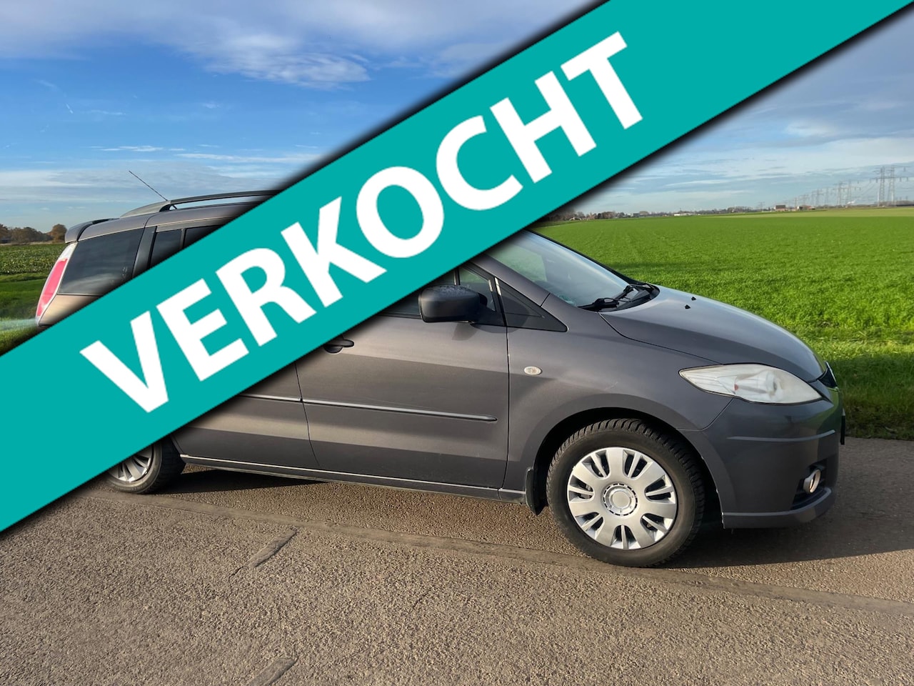 Mazda 5 - 2.0 Business / 7 pers (tik in motor) - AutoWereld.nl
