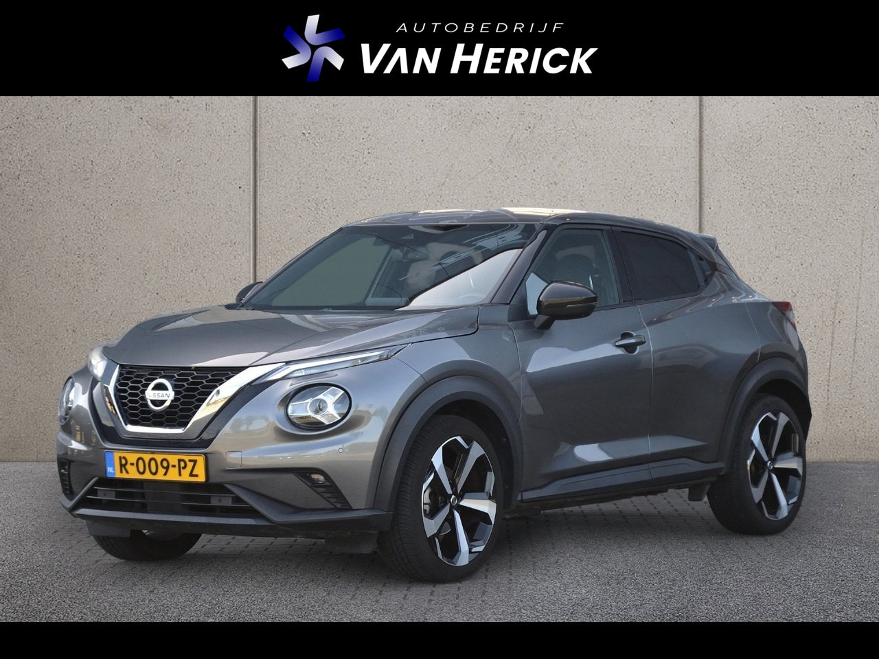 Nissan Juke - 1.0 DIG-T Tekna Automaat | Navigatie | Stoelverwarming | Achteruitrijcamera - AutoWereld.nl