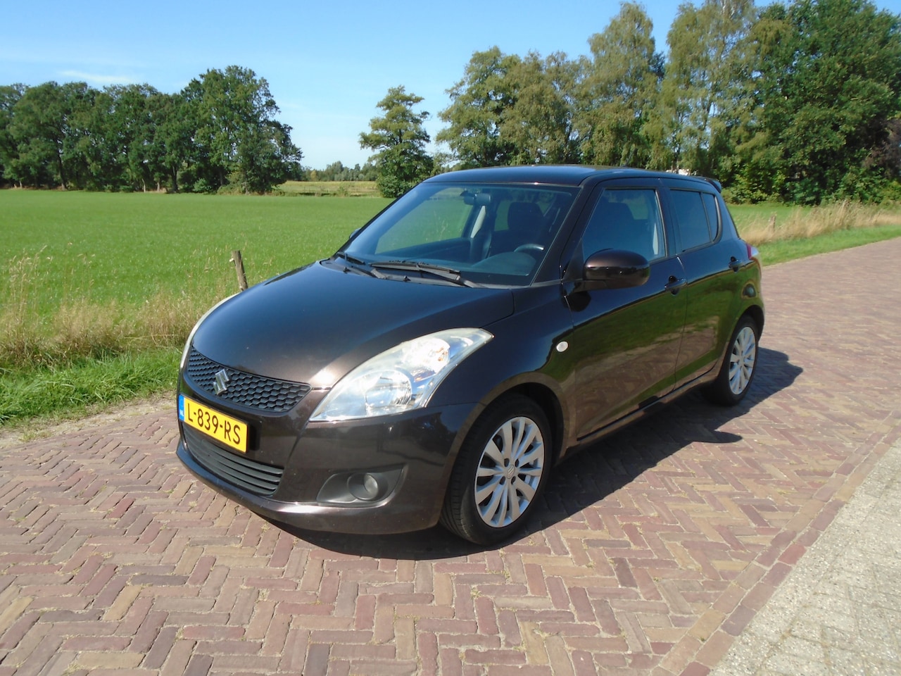 Suzuki Swift - 1.2 Bandit EASSS 5DRS CRUISE A/C - AutoWereld.nl