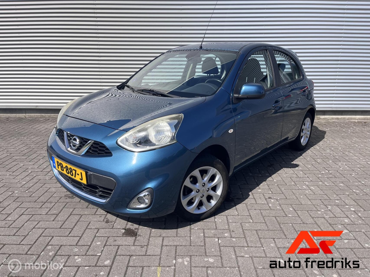 Nissan Micra - 1.2 Acenta | Trekhaak | All-Season | Climate - AutoWereld.nl