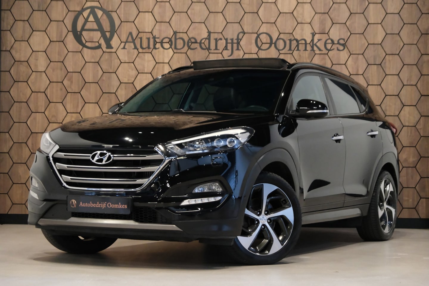 Hyundai Tucson - 1.6 T-GDi 4WD *PANORAMADAK* Leder/Afn. Trekhaak/Navi/Camera/ALL-Seasons - AutoWereld.nl