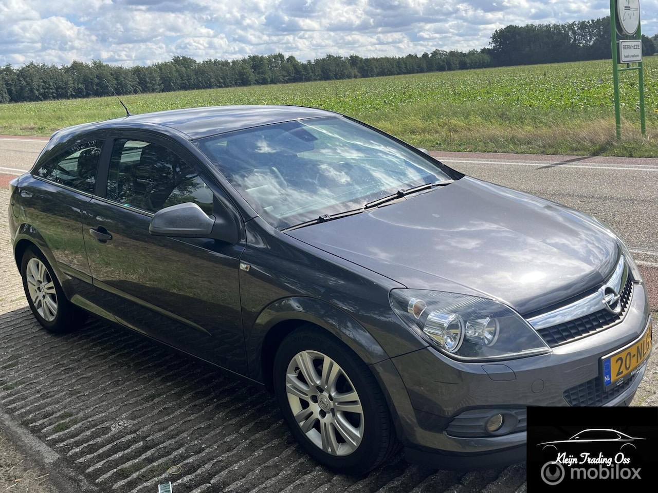 Opel Astra GTC - 1.6 Navi Leer - AutoWereld.nl